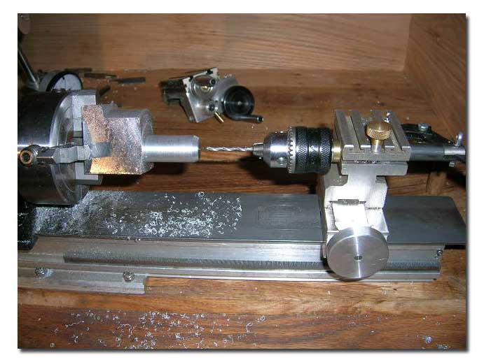Drilling the pilot hole in the barrel. Drilling the pilot hole in the barrel.
